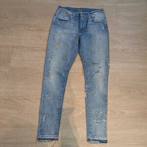 Levi's light distressed raw hem high rise skinny